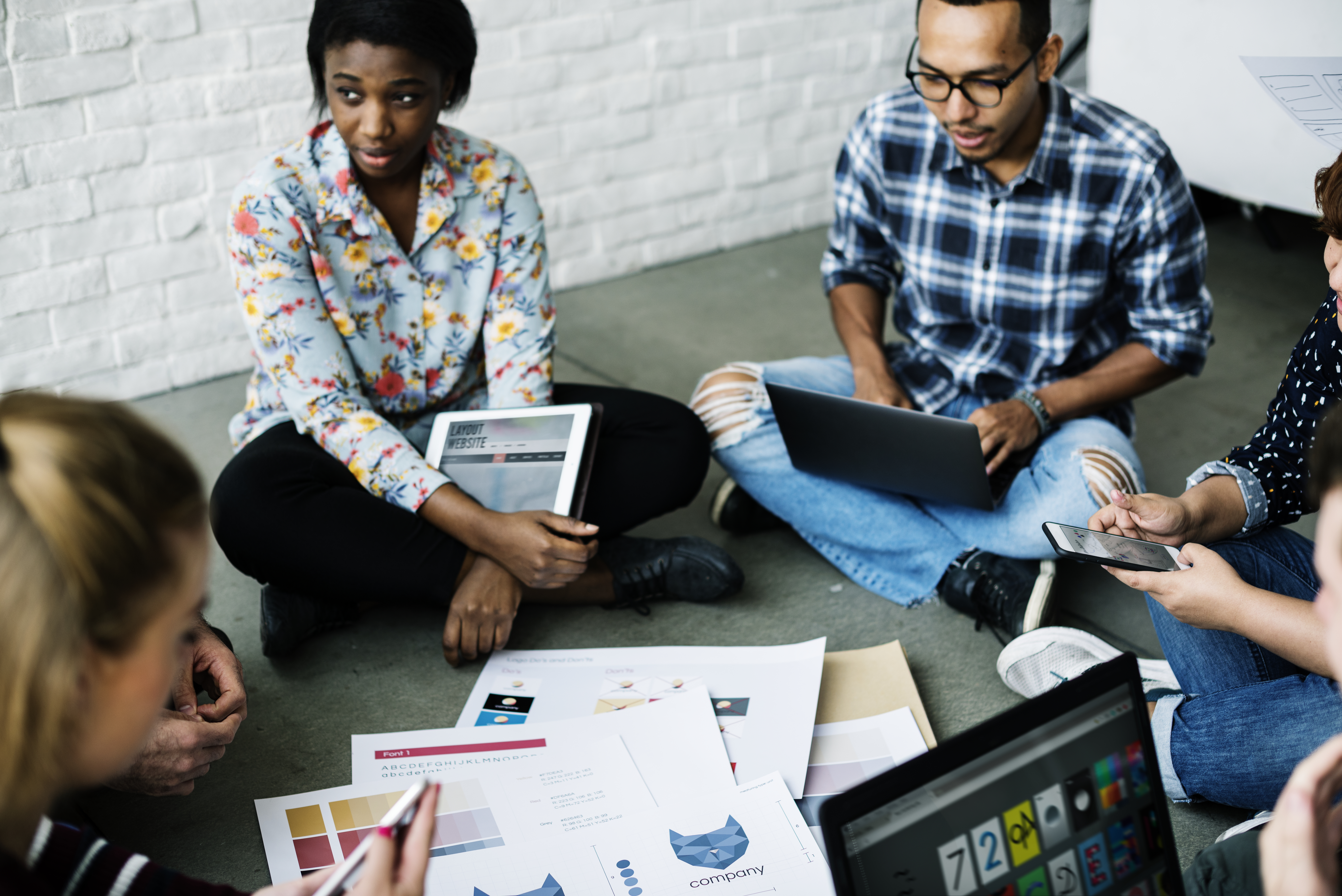 Team of SEO specialists analyzing data and brainstorming strategies